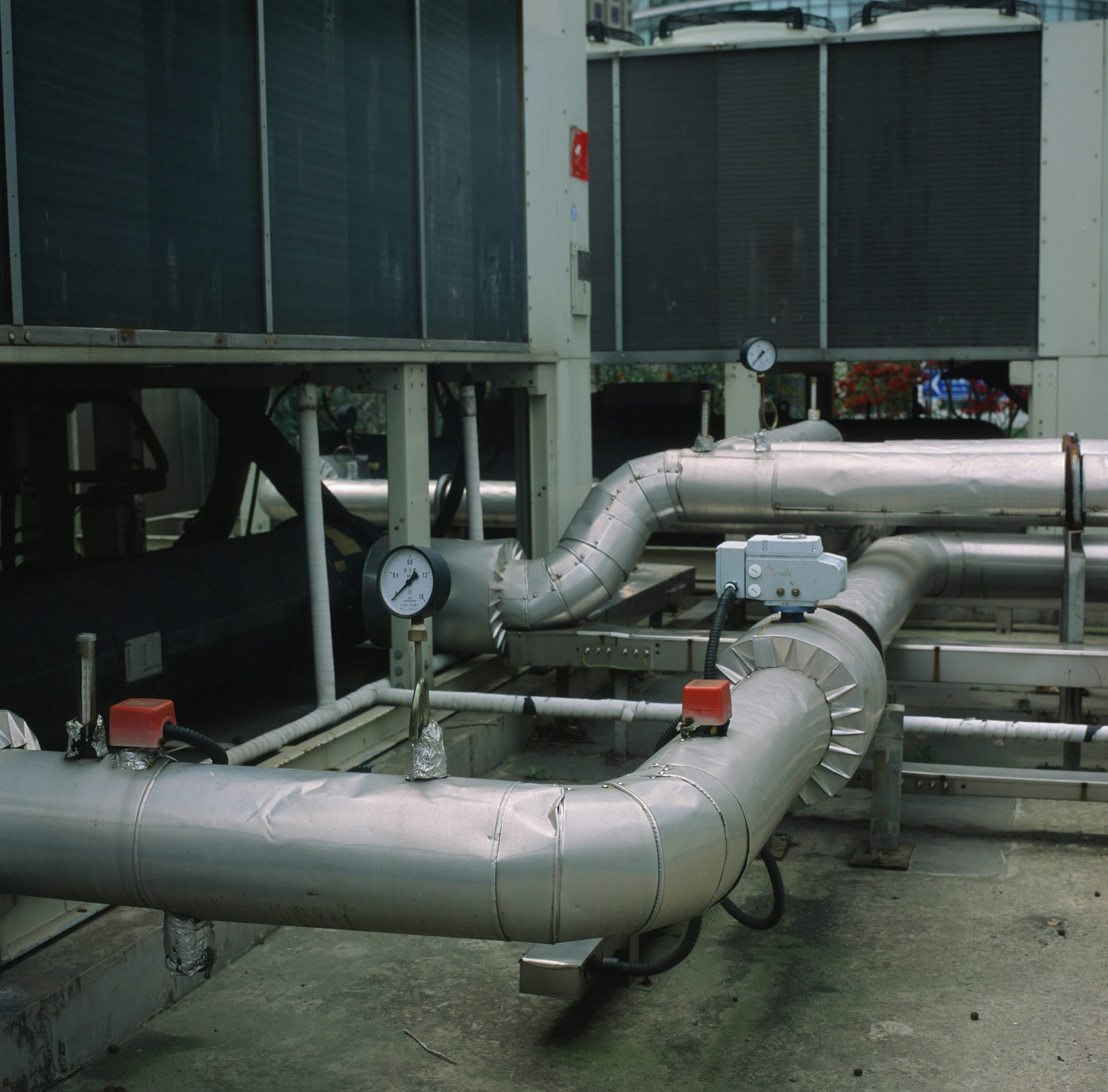 Mechanical plant room with pipes and gauges
